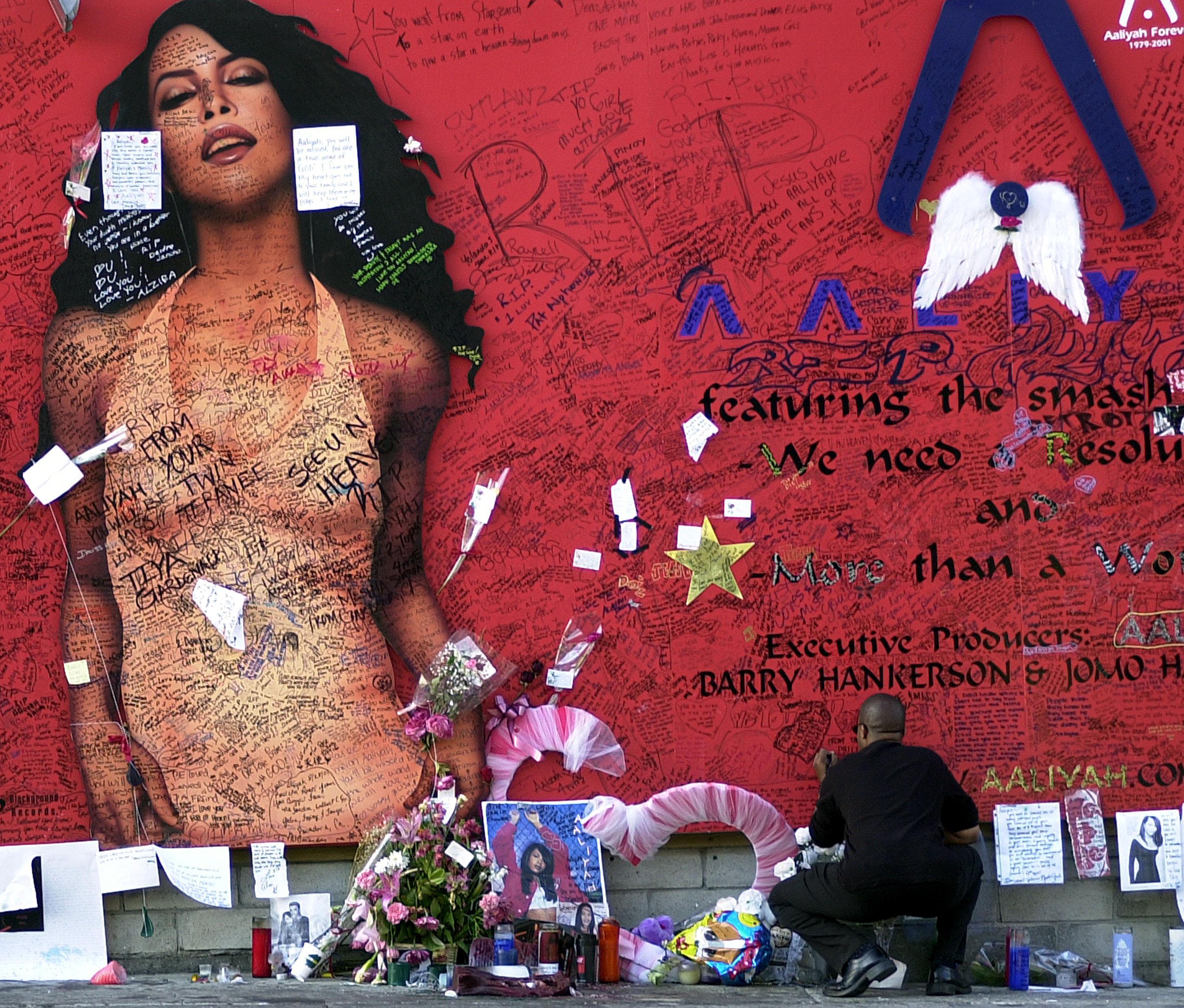 Aaliyah Fans Sign Mural In Tribute