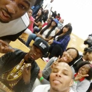 Bandit Gang Marco / REEC / Mykko Montana jump in the crowd to take pics with students.