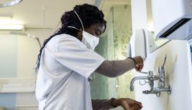 Female healthcare worker washing her hands