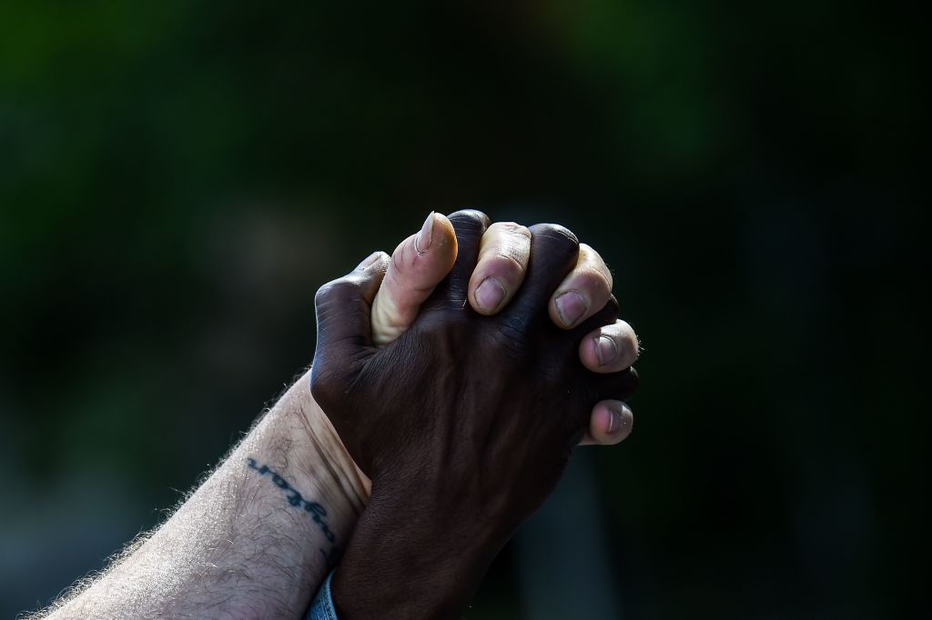 TOPSHOT-US-POLICE-RACISM-SHOOTING-POLITICS-PROTEST