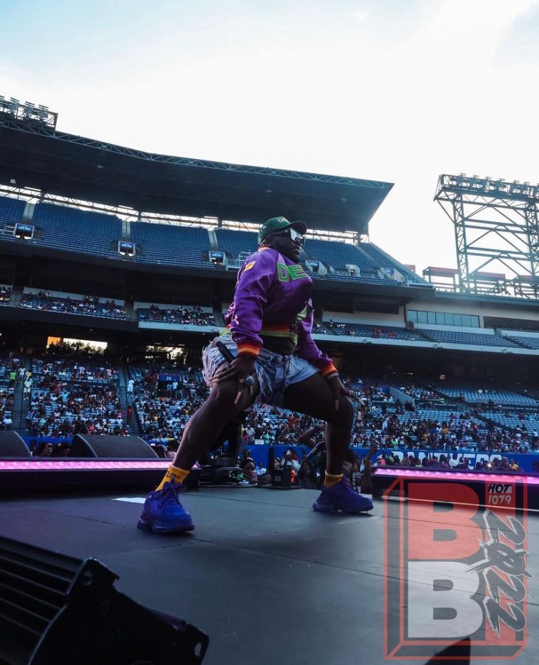 Saucy Santana dancing on the Birthday Bash ATL stage