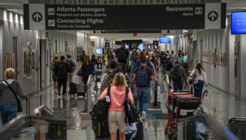 Passengers head to US Customs at Hartsfield-Jackson Atlanta...
