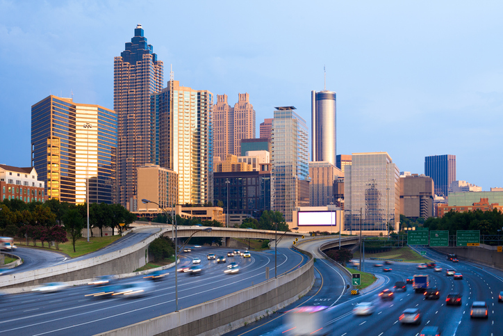 Cityscape Of Downtown Atlanta At Sunset With Traffic In The Freeway, Georgia, United States